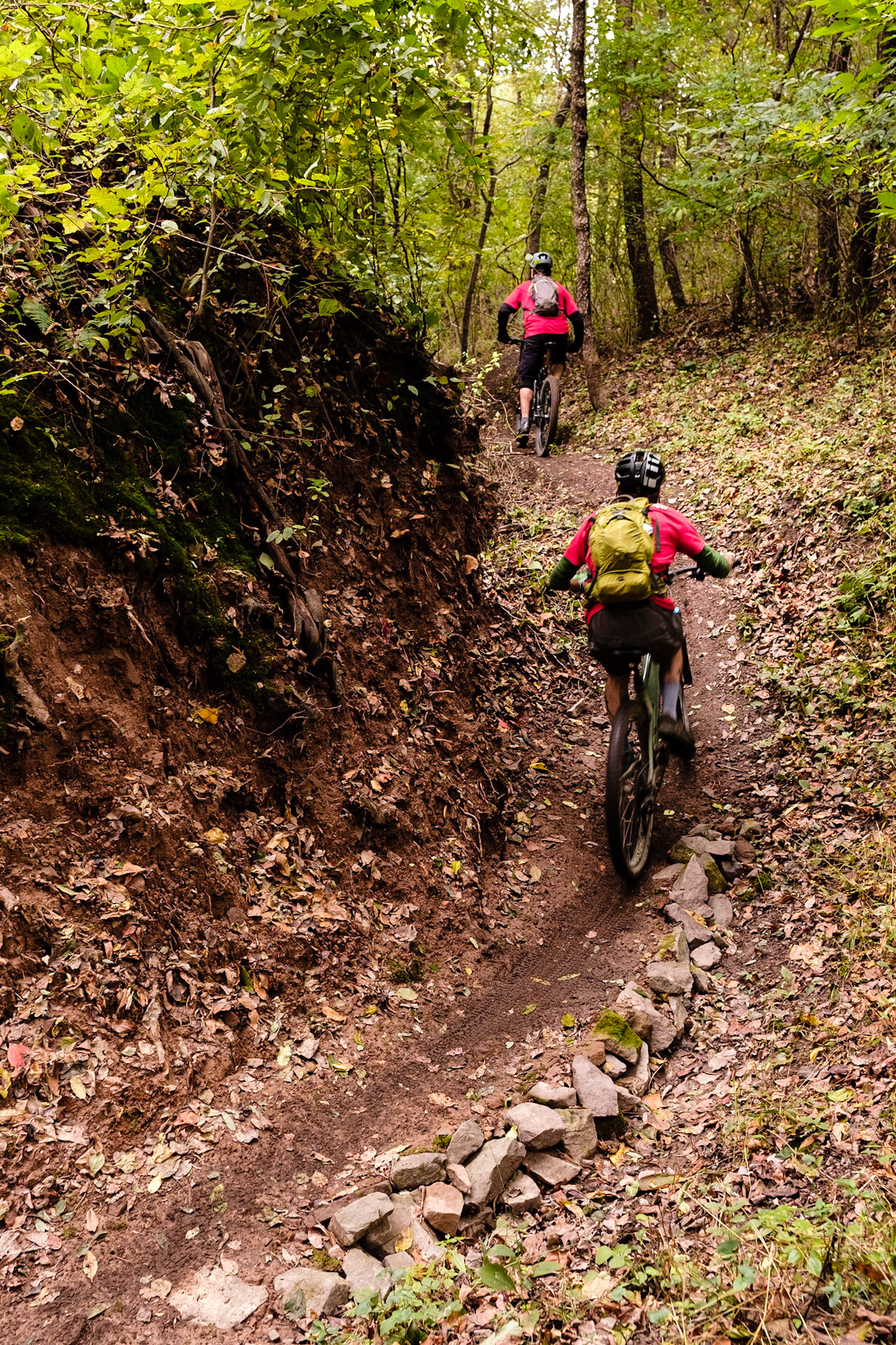 two people biking trails